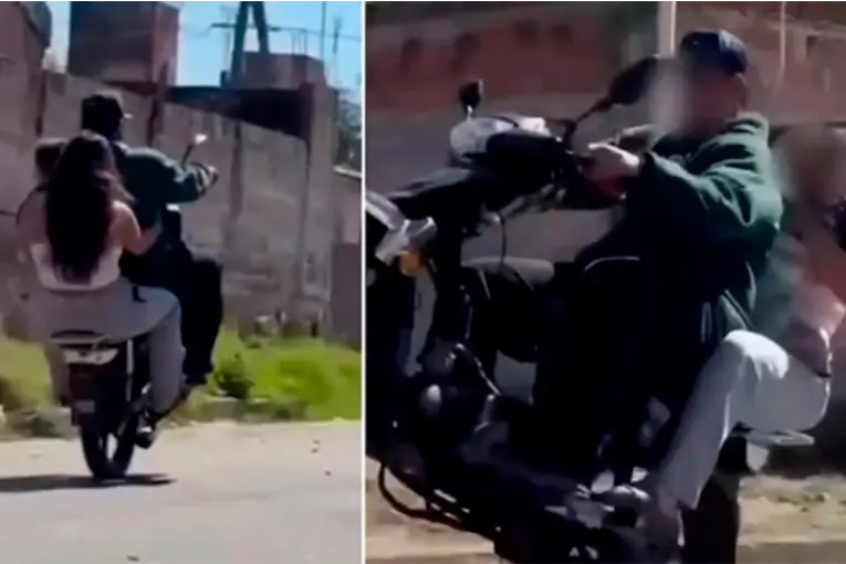 Con un bebé en brazos y sin casco, una pareja hizo una maniobra peligrosa en una moto: “Un willy con el gordito”